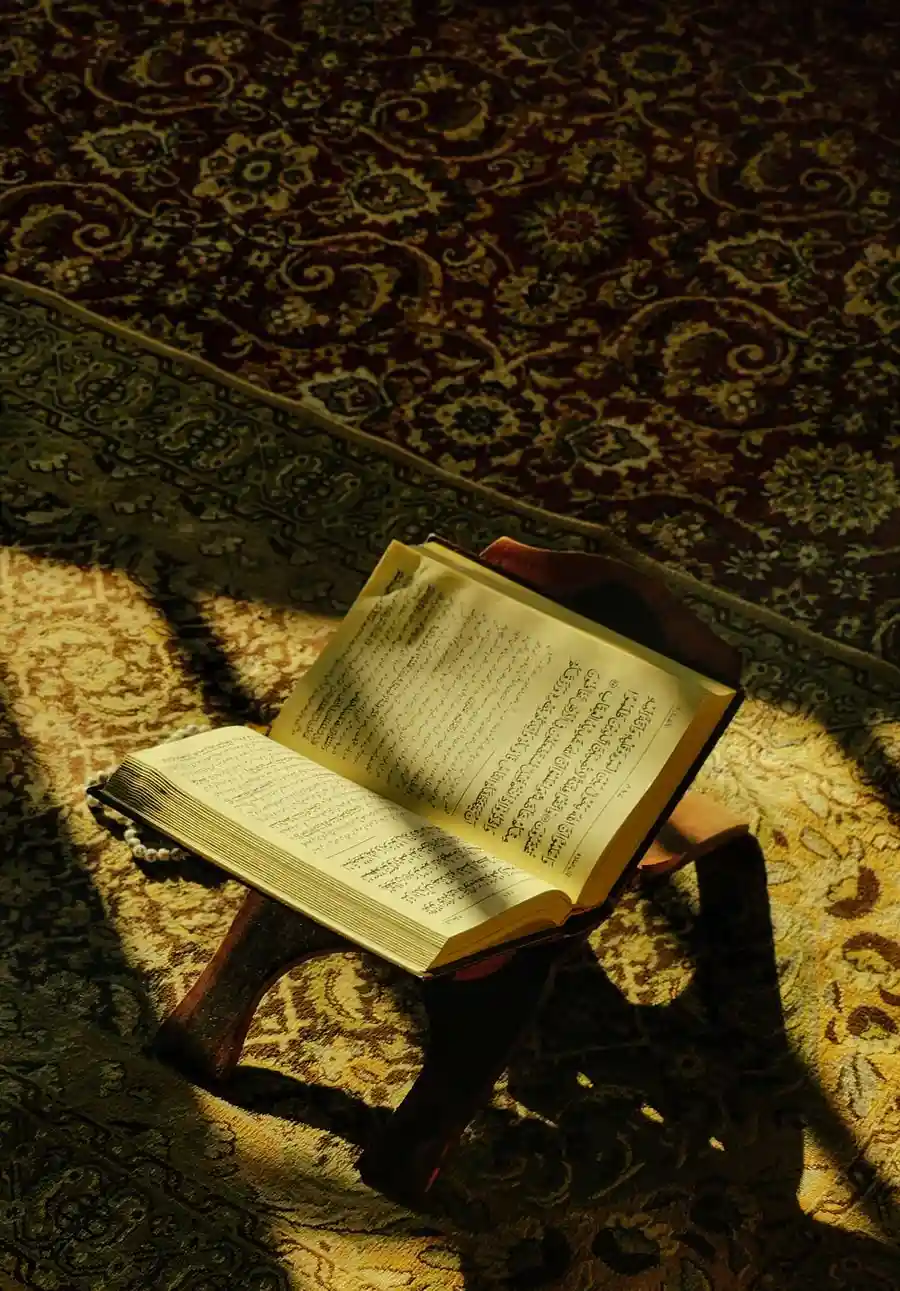 Young Muslim boy learning online from home